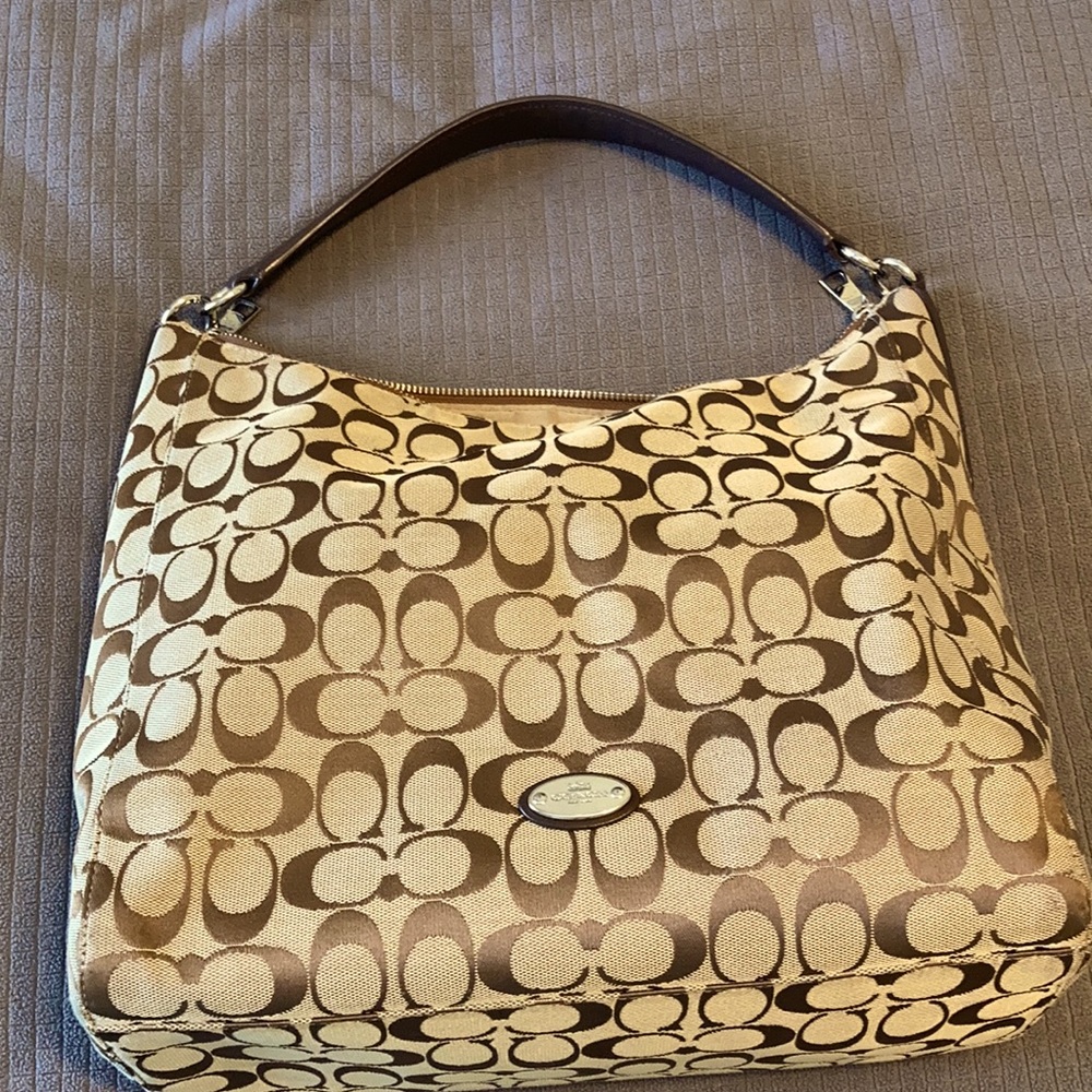 Coach Hobo style brown cloth handbag.